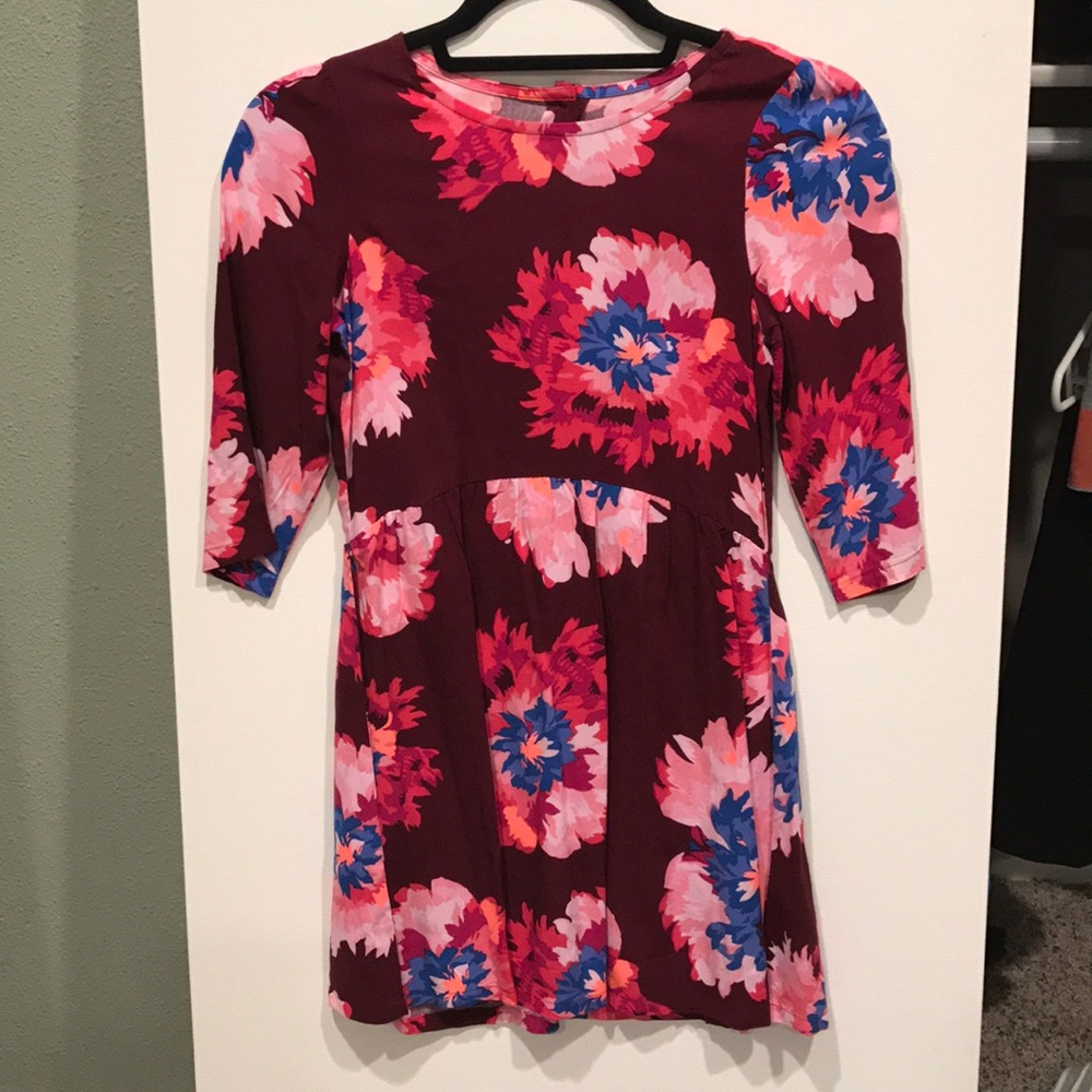 Crazy 8 floral dress with buttons on the back.